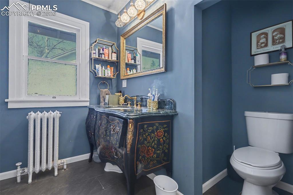 Image 27 of 46: Upper level bathroom with clawfoot tub