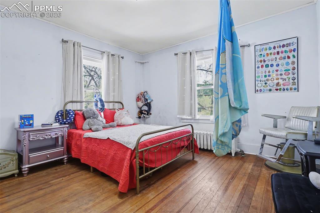 Image 30 of 46: Upper level bedroom 