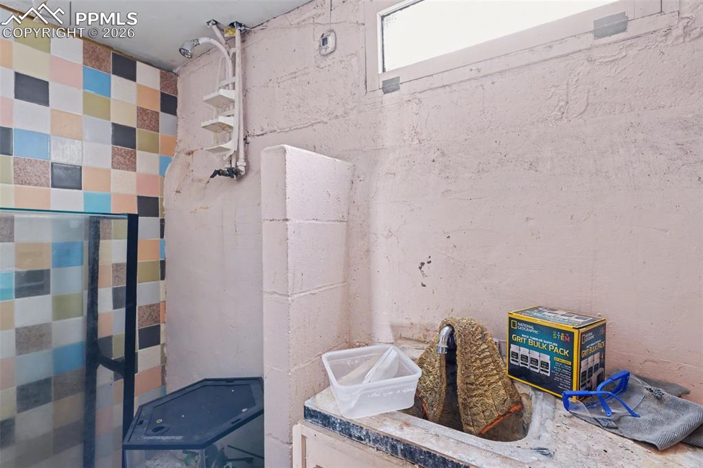 Image 35 of 46: Basement unfinished bathroom