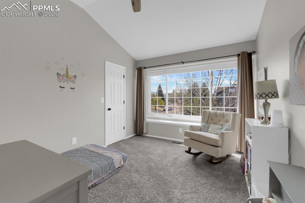 Image 24 of 39: Bedroom 2 -walk in closet & Mtn Views