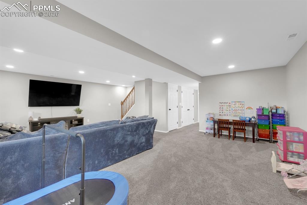 Image 26 of 39: Basement family room 