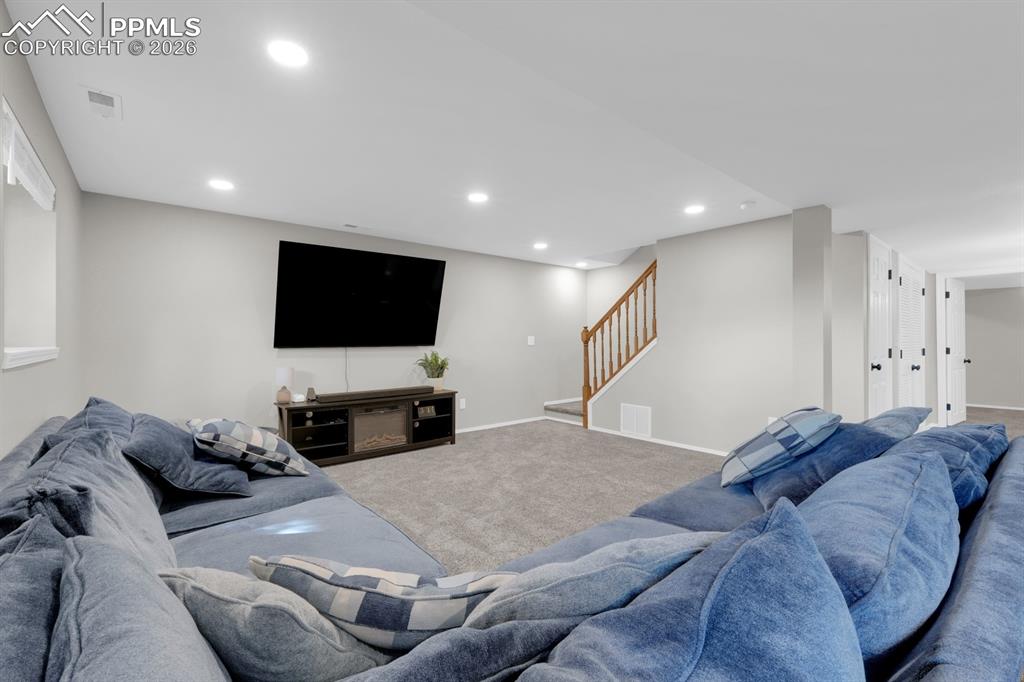 Image 27 of 39: Basement family room 