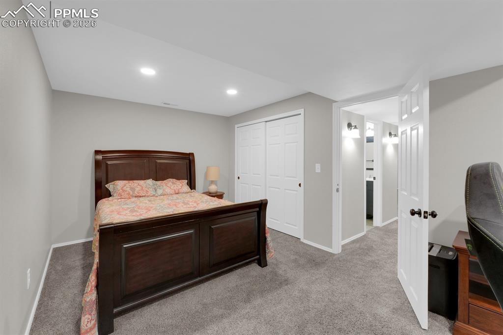 Image 28 of 39: Basement bedroom 