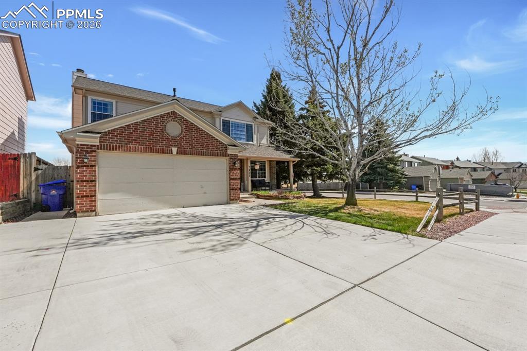 Image 34 of 39: Oversized concrete driveway