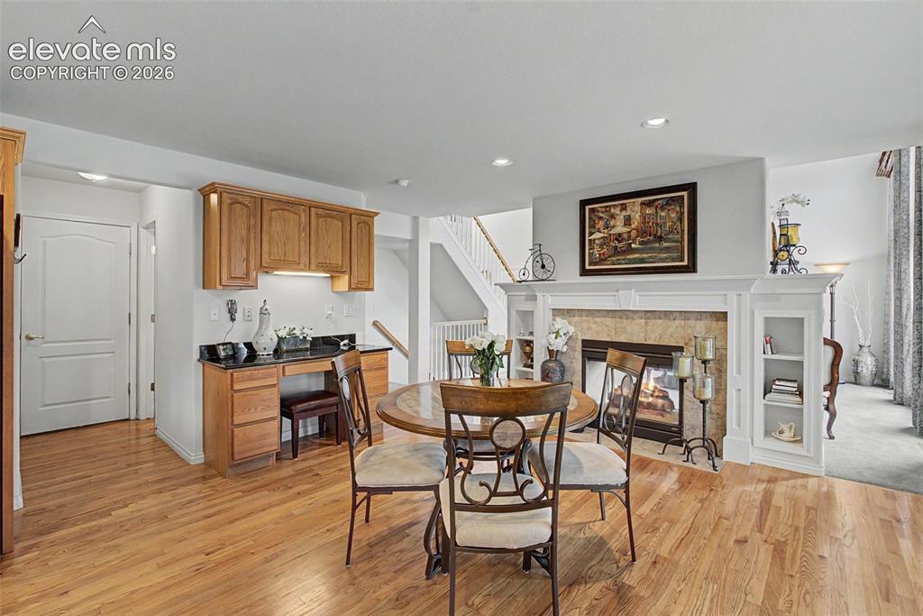 Image 13 of 50: The Kitchen Truly is the Heart of the Home with a Built in Desk to Keep the