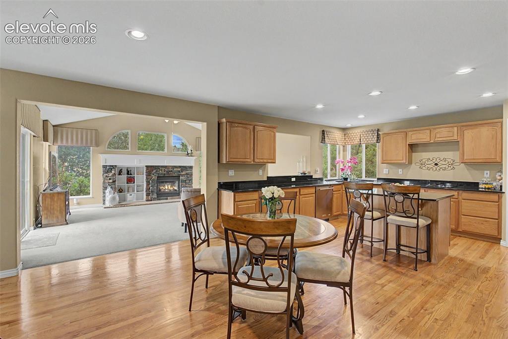 Image 14 of 50: The Breakfast Nook Flows Seamlessly into the Handsome Family Room!