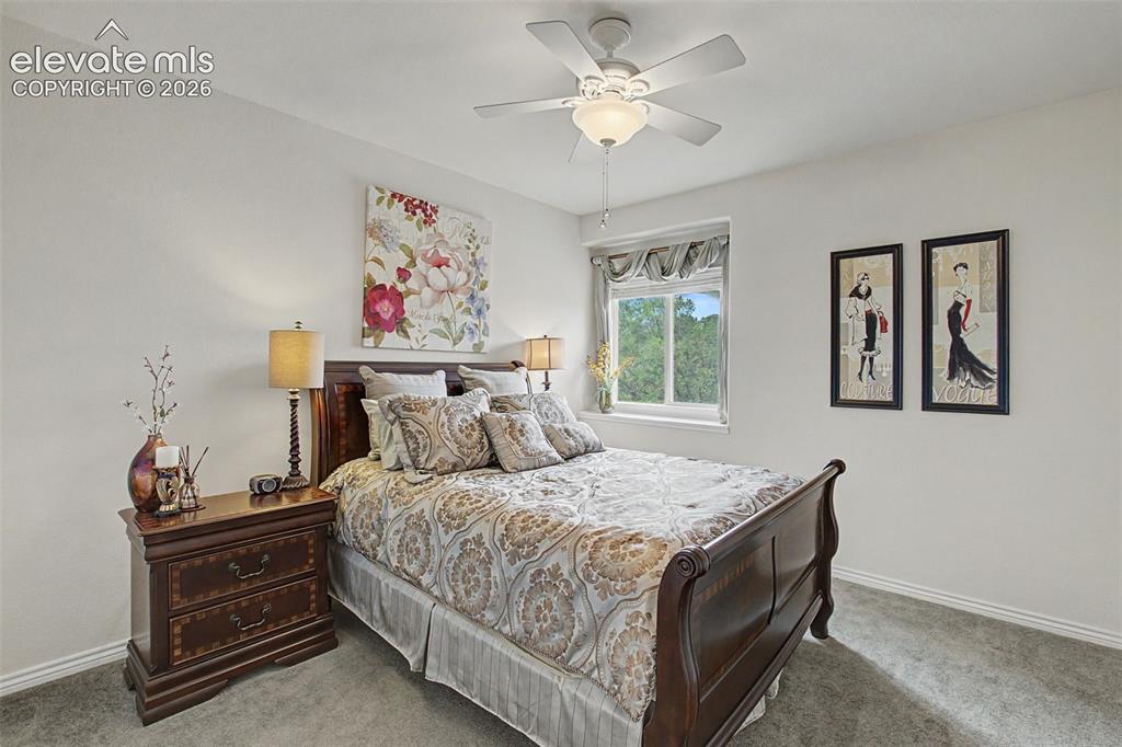 Image 28 of 50: 1 of 2 Upper Level Bedrooms with a Nice Sized Closet and Ceiling Fan!