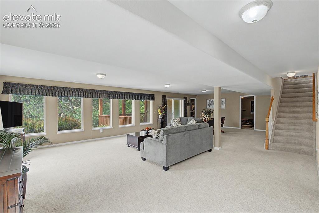 Image 32 of 50: Bright, Airy Basement with Walk-out Access to Back Deck!