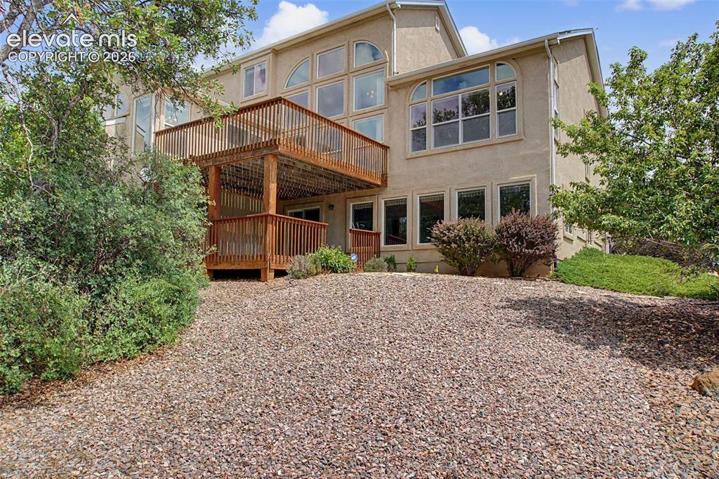 Image 38 of 50: 2 Story Deck Perfect for Entertaining and Enjoying the Views of the Front R