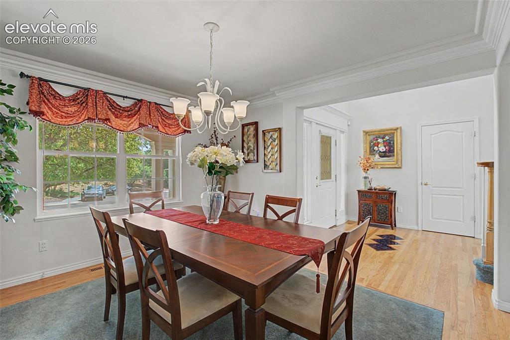 Image 5 of 50: Formal Dining Room!