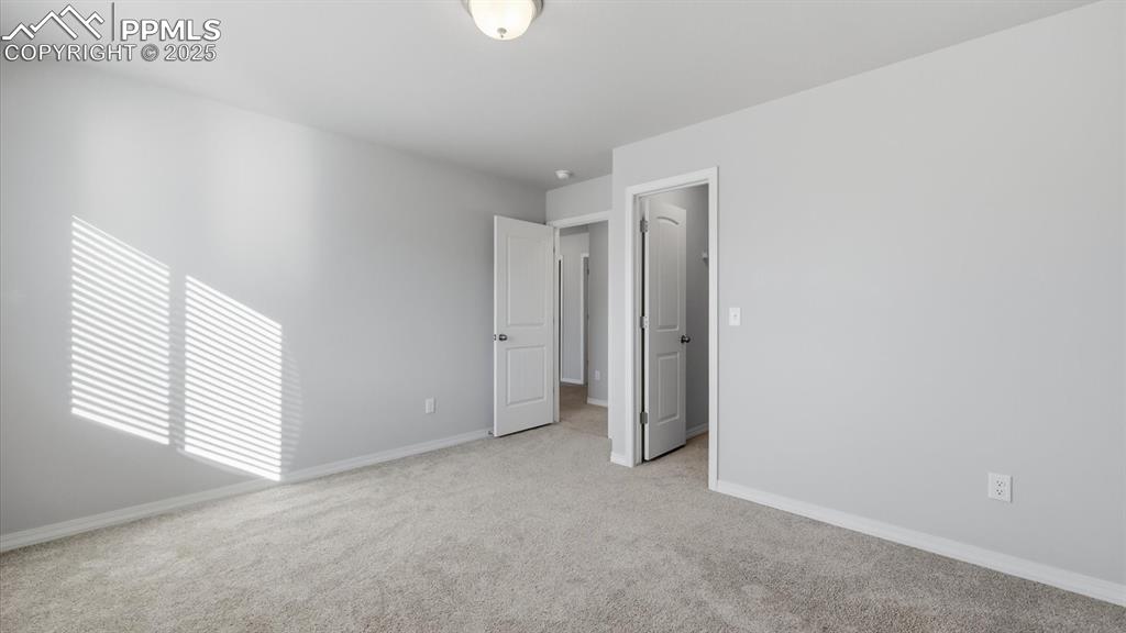 Image 23 of 36: Bedroom #2 offers a walk in closet.