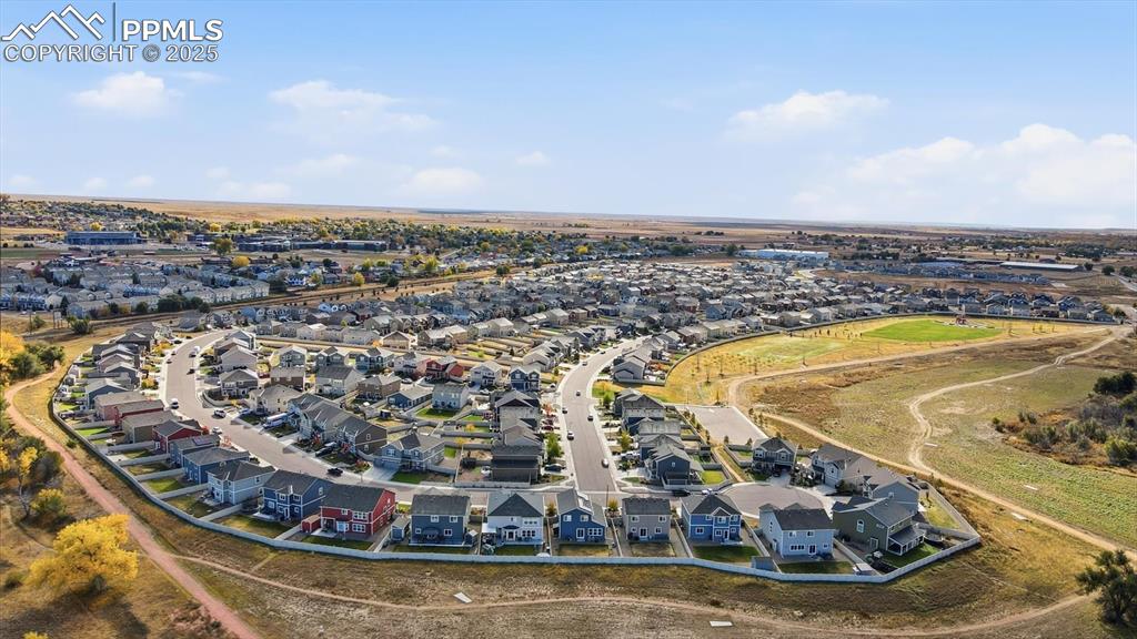 Image 35 of 36: Aerial rear view of home, yard, and miles of trails!