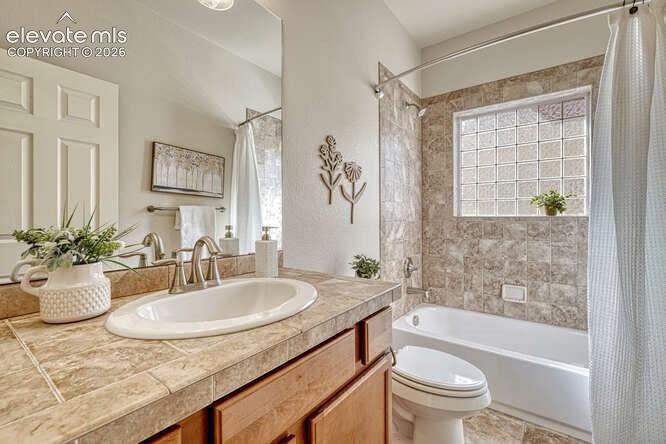 Image 18 of 42: Main level Full Guest Bathroom