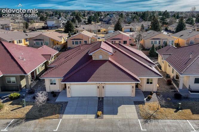 Image 2 of 42: Aerial view of the Patio Home with it