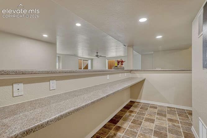 Image 24 of 42: Plenty of counter space in this giant bar area!
