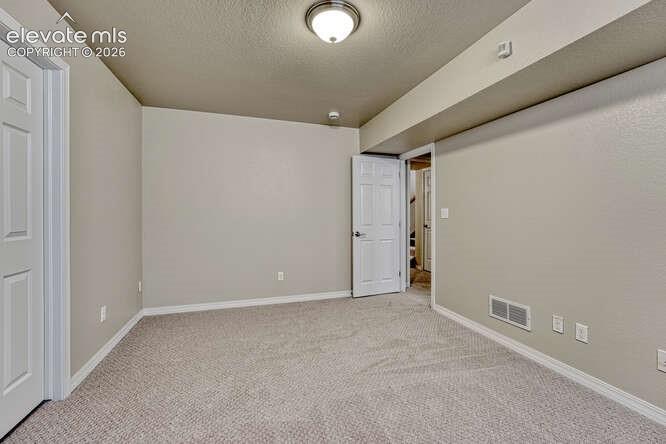 Image 27 of 42: Basement bedroom #4 has a walk-in closet