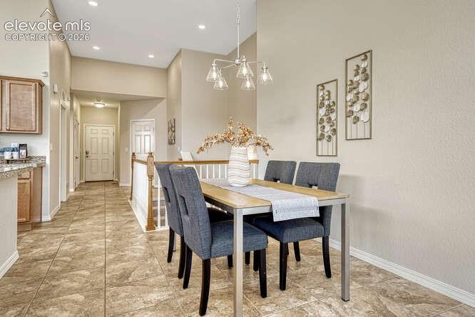 Image 6 of 42: Spacious dining area just adjacent from the kitchen.