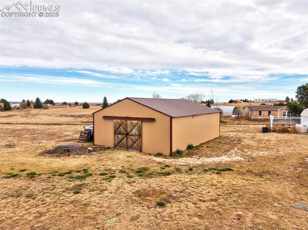 Image 23 of 31: View of pole building with a view of countryside
