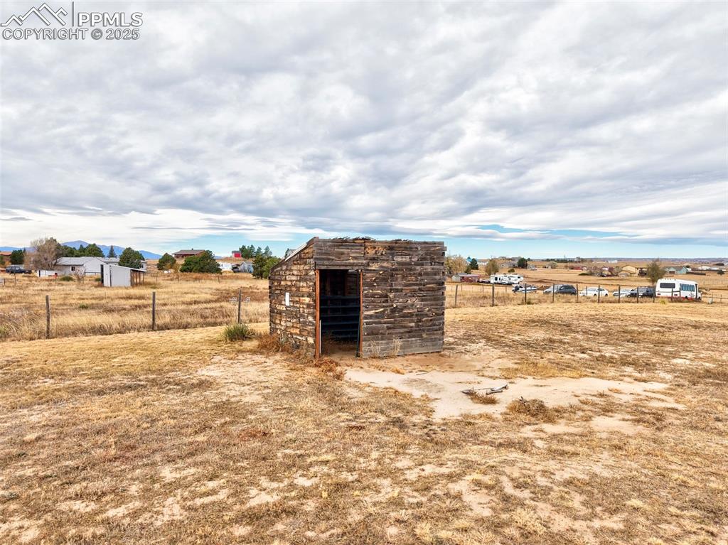 Image 24 of 31: View of outbuilding with a view of countryside