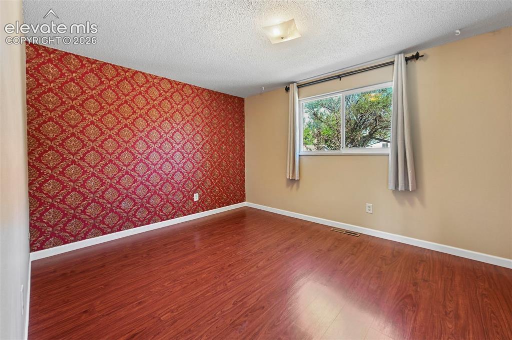 Image 12 of 34: Master Bedroom