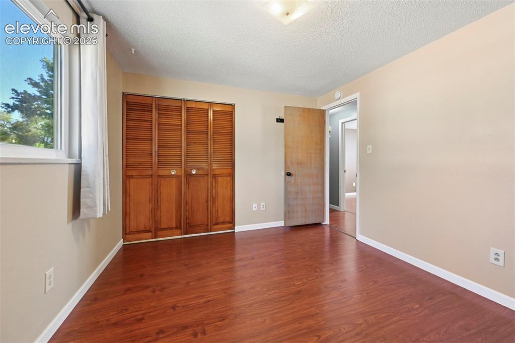 Image 13 of 34: Master Bedroom