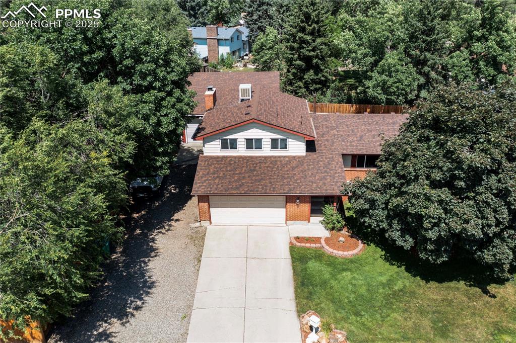 Image 2 of 50: Aerial view of property and surrounding area