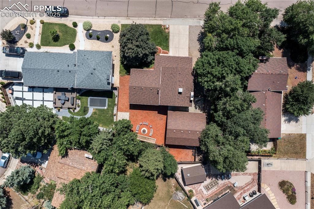 Image 50 of 50: Aerial view of property and surrounding area with nearby suburban area