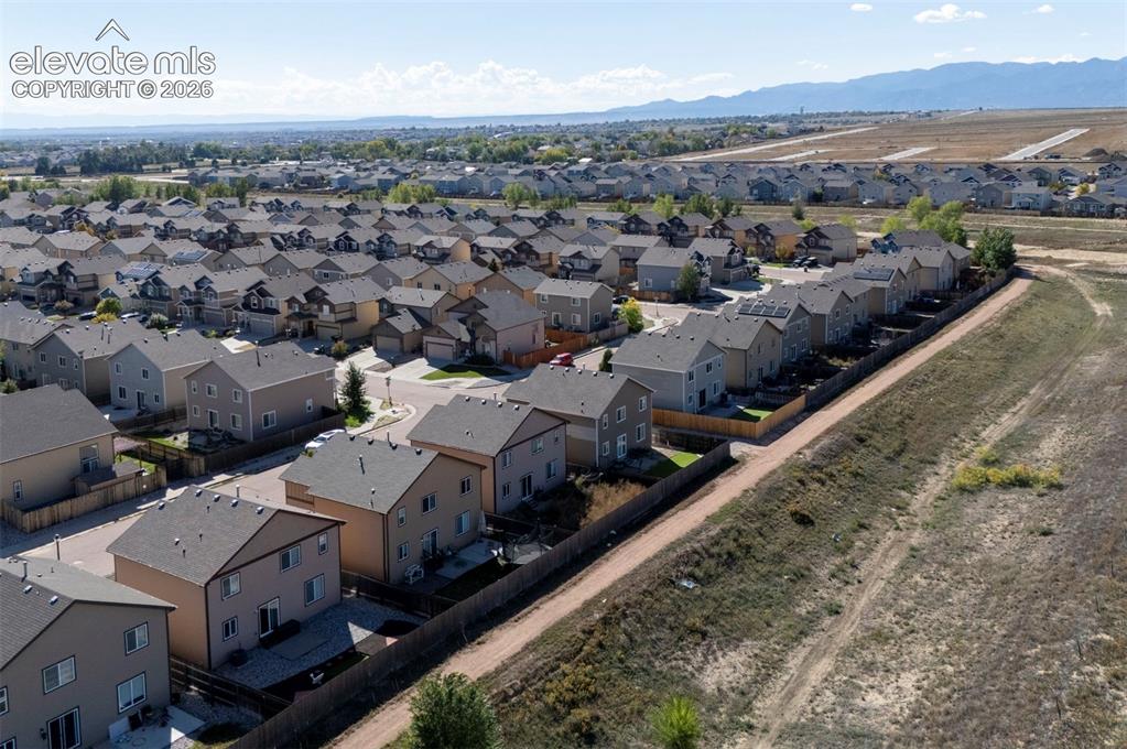 Image 43 of 45: Residential neighborhood featuring multiple detached homes with pitched roo