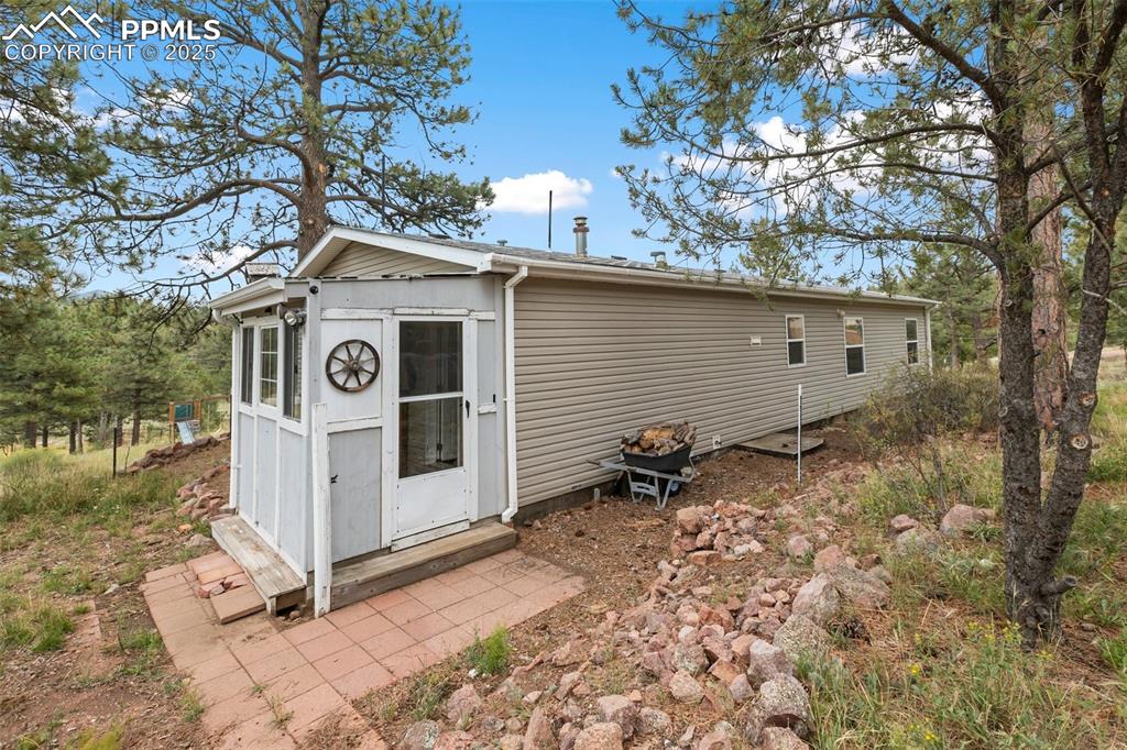 Image 3 of 37: Mud room entry on side/rear of house.