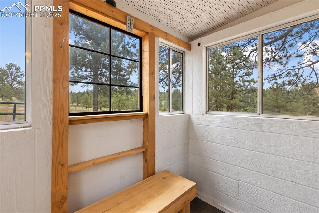 Image 31 of 37: Unfurnished sunroom featuring plenty of natural light