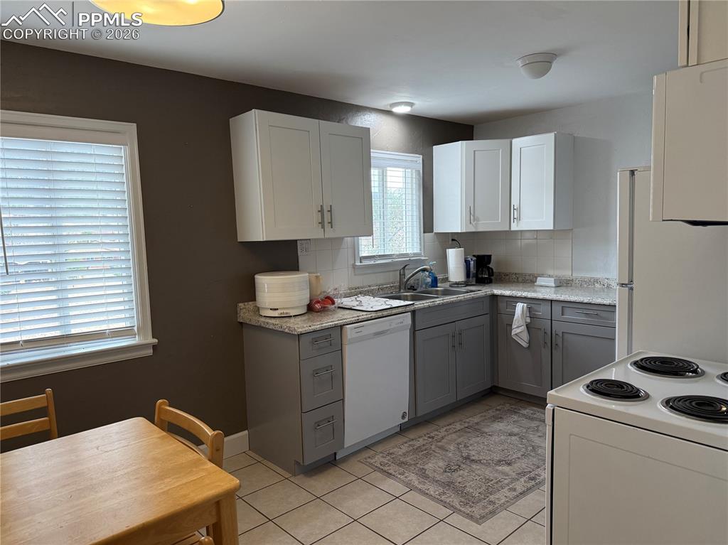 Image 6 of 24: Upstairs Kitchen