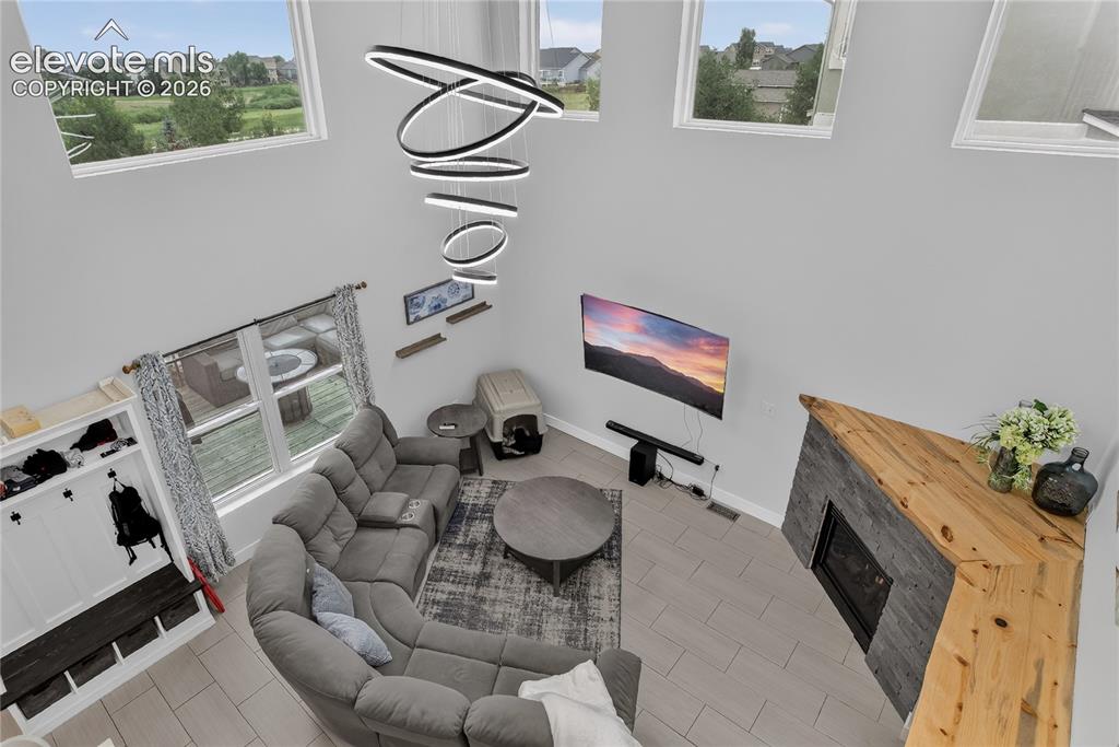 Image 13 of 29: 2-story ceilings in great room