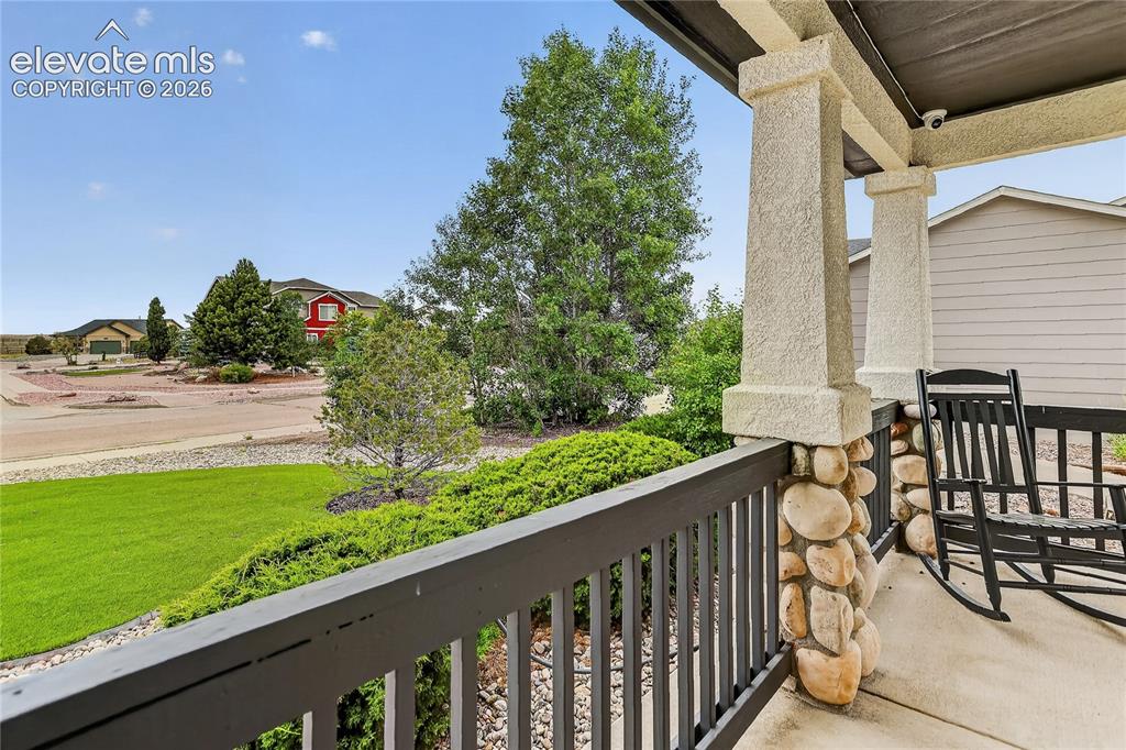 Image 2 of 29: Spacious, covered front porch