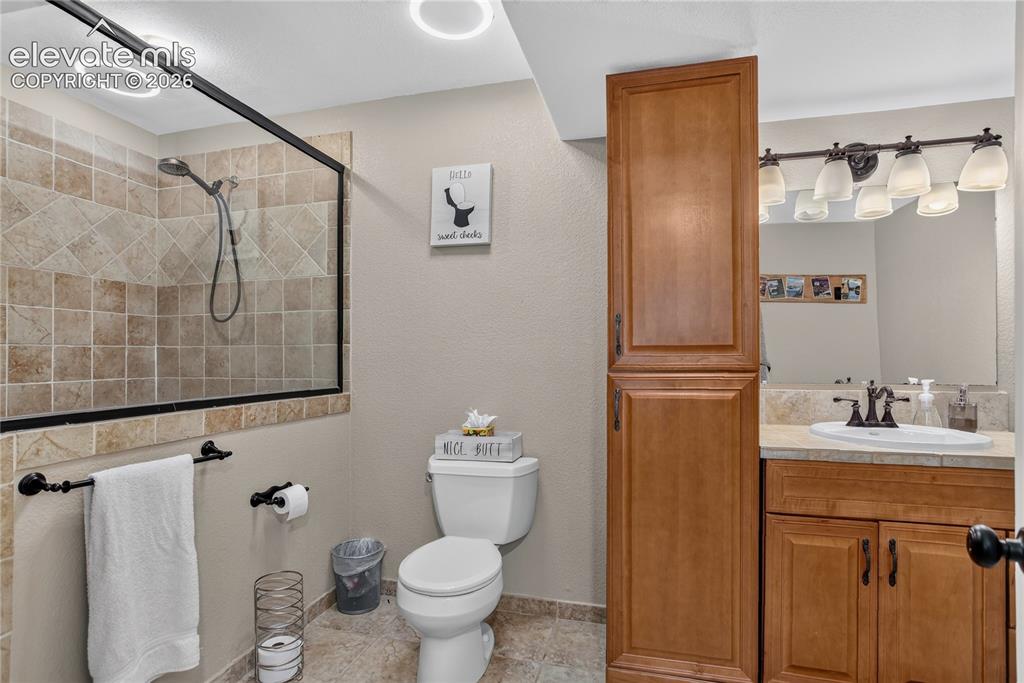Image 24 of 29: Guest bath - lower level