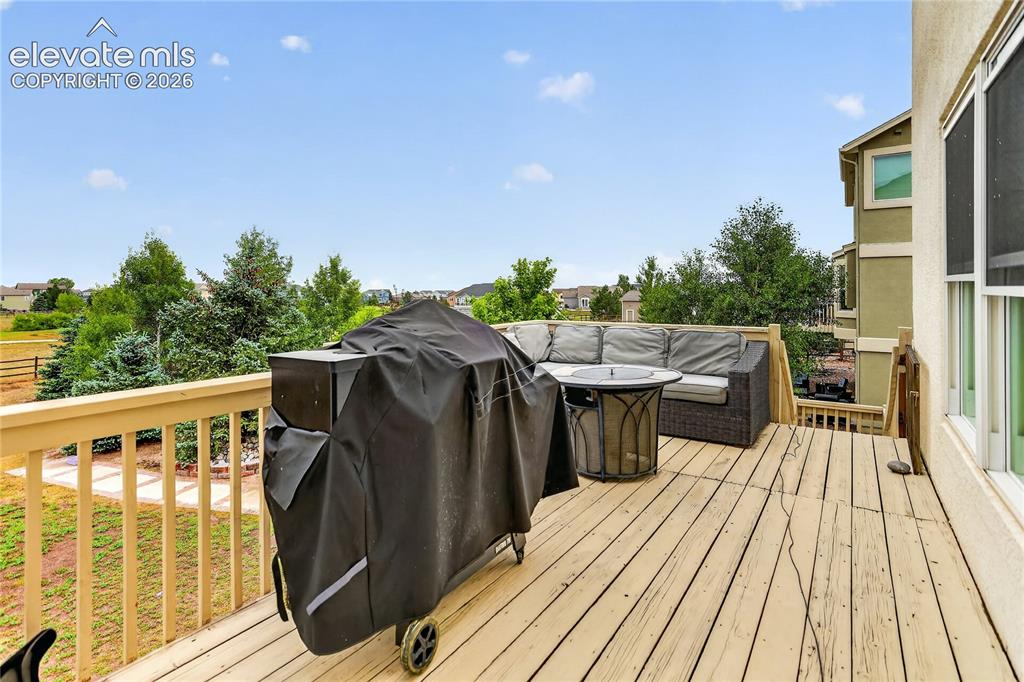 Image 25 of 29: Deck off of wet bar area