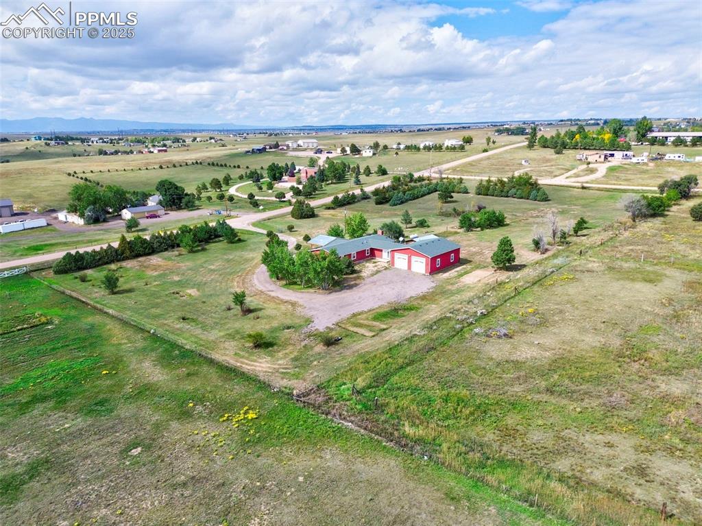 Caption: Over 5 acres, fenced, trees, Oversized garage