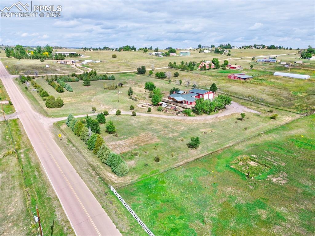 Image 41 of 50: Over five acres fenced in.