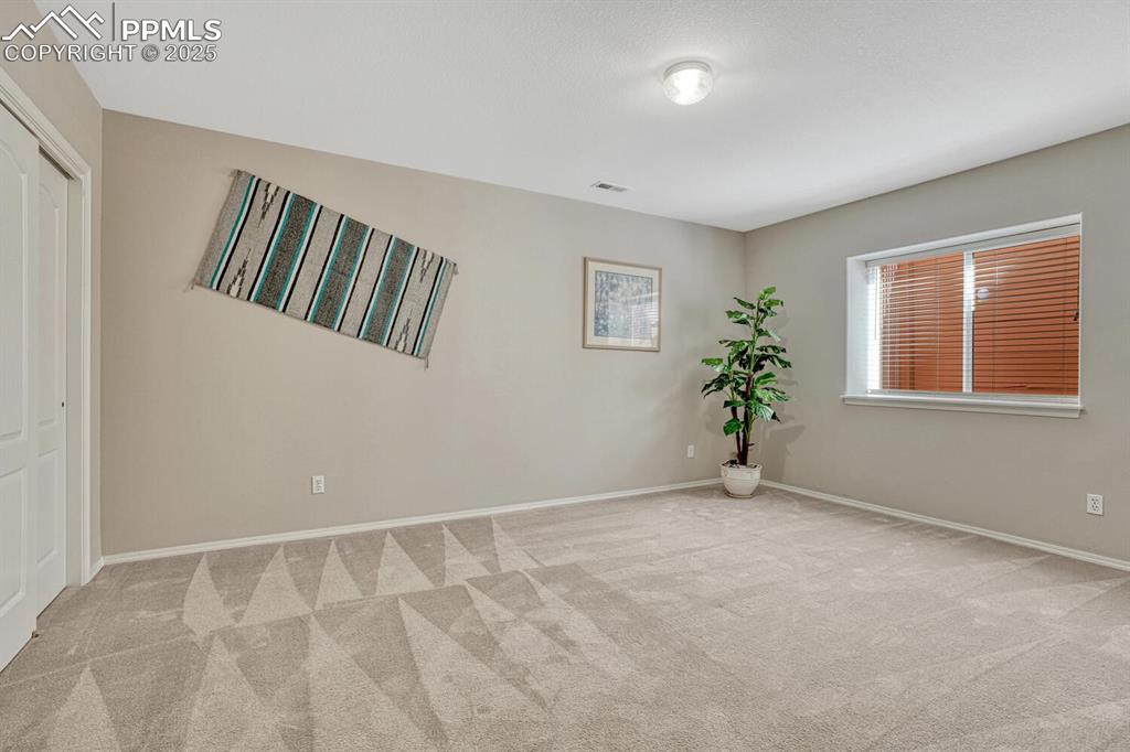 Image 39 of 48: Large basement bedroom!
