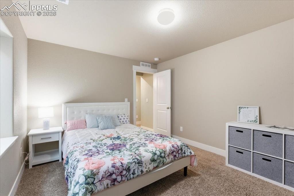 Image 33 of 48: Bedroom
