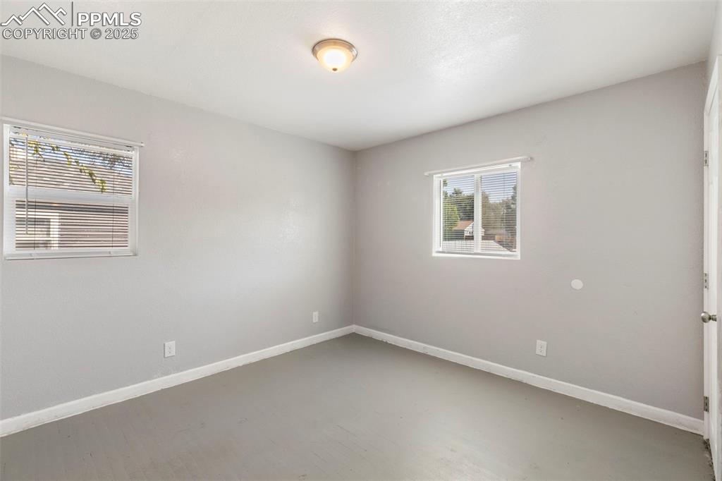 Image 9 of 25: Empty room with baseboards