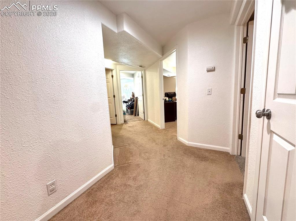 Image 27 of 35: Basement Hallway