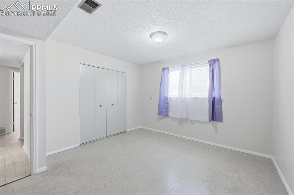 Image 28 of 37: Bedroom