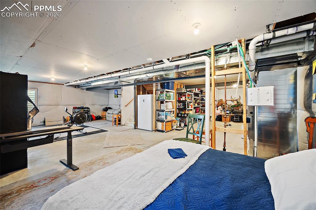 Image 30 of 41: Unfinished basement