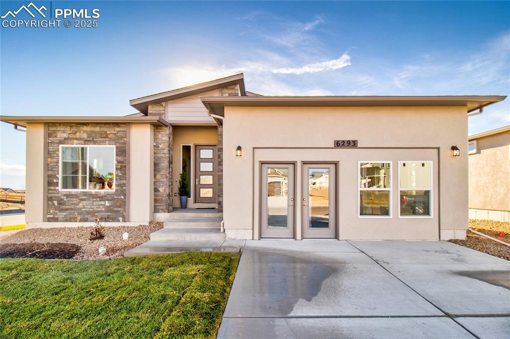 Caption: FORMER MODEL HOME 