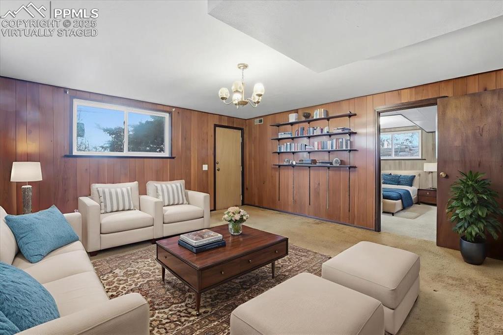 Image 13 of 50: Virtually Staged Basement Living Room