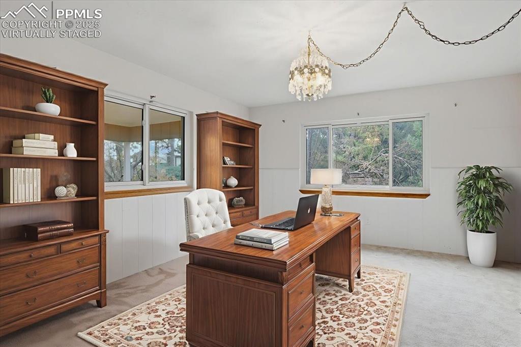 Image 17 of 50: Virtually Staged Dining area as Office.