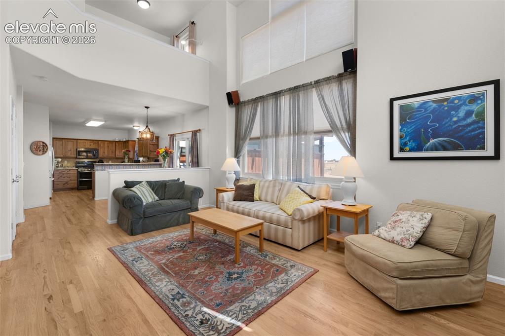 Image 13 of 50: Expansive Natural Hardwood Flooring