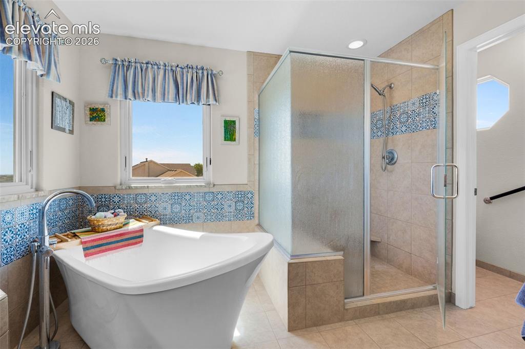Image 24 of 50: Relax Your Cares Away In The Soaking Tub
