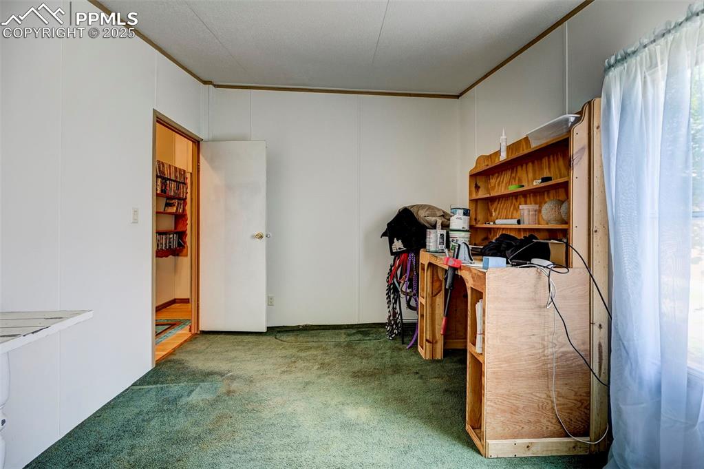 Image 16 of 44: Bedroom 2 with ornamental molding