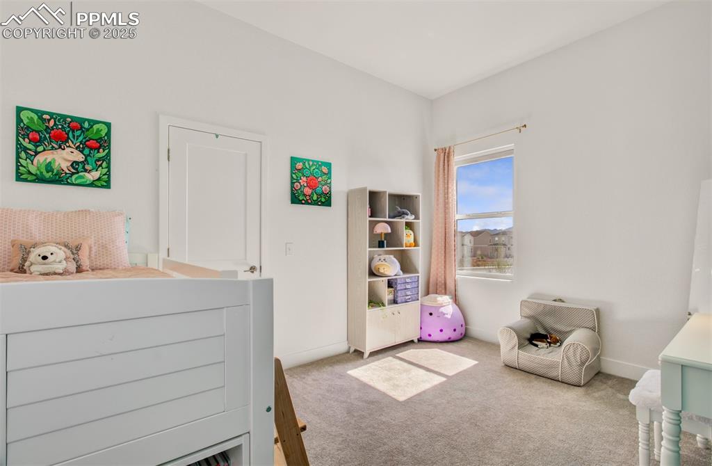 Image 17 of 48: 2nd main level bedroom